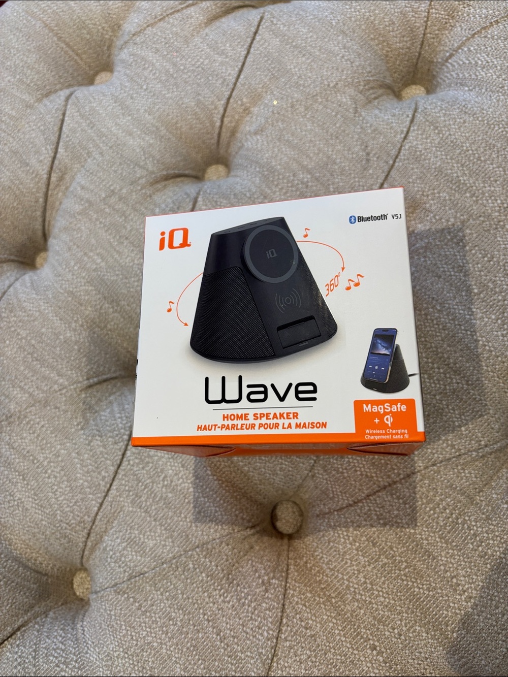 iQ Wave All-in-one wireless charging Bluetooth speaker.